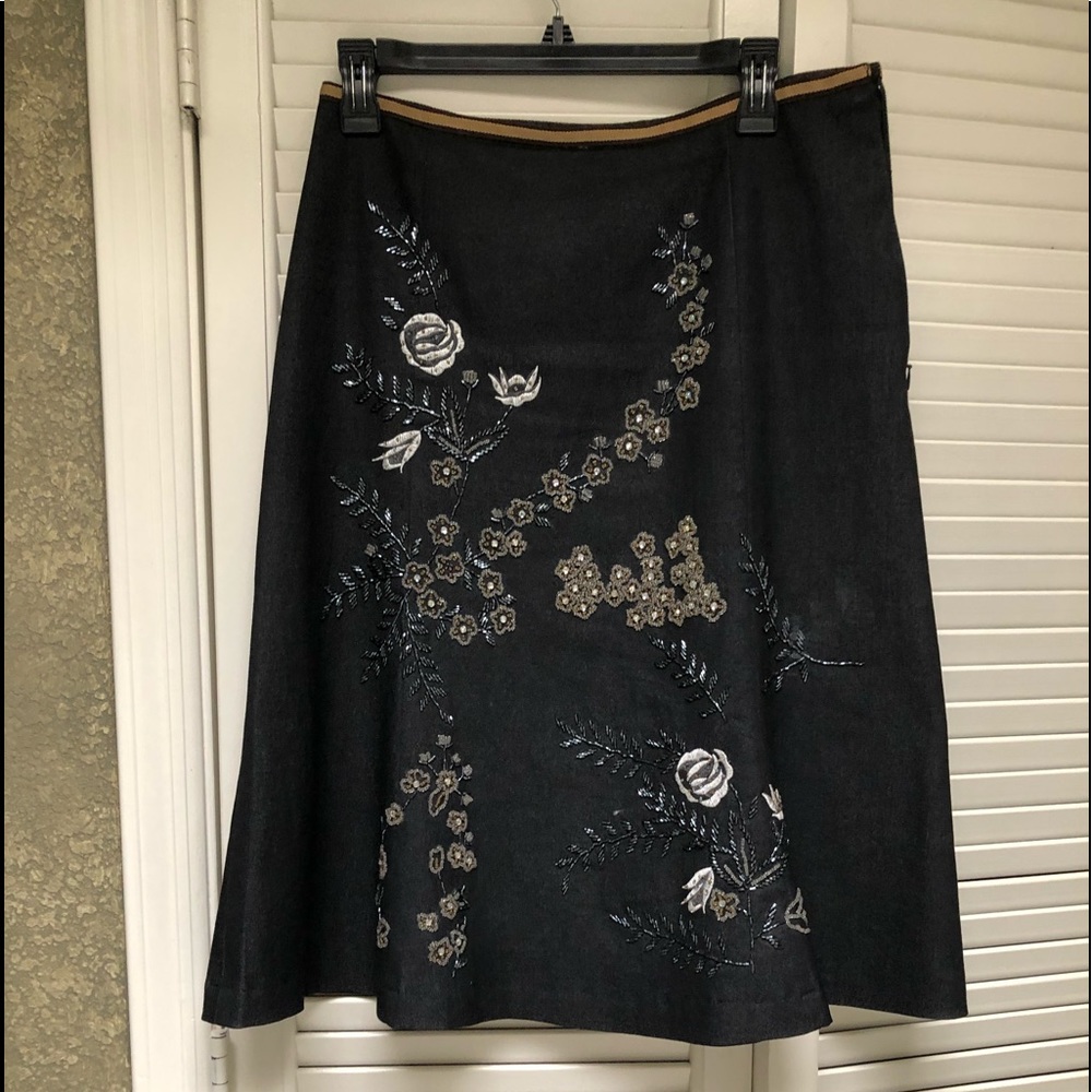 Dark denim stud and embellished skirt.  A-line